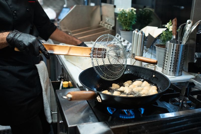 Wing Snob kitchen — bold crispy wings being prepared in Katy TX