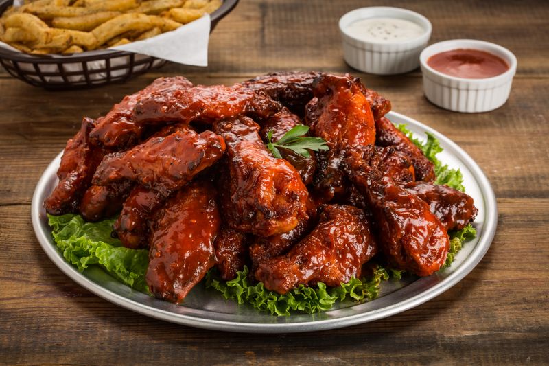 Party catering setup with Wing Snob branded trays